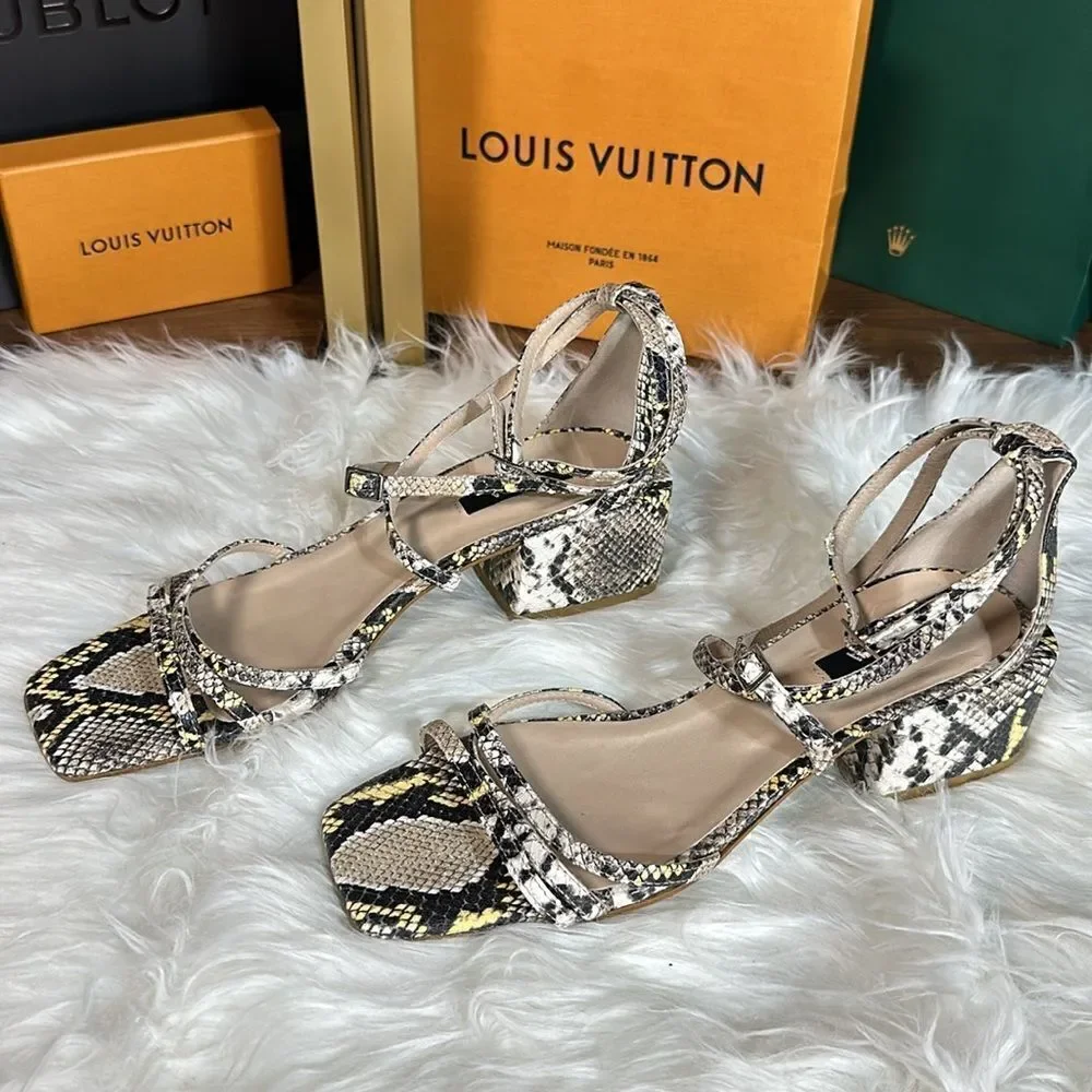 Unworn snake print wedges
